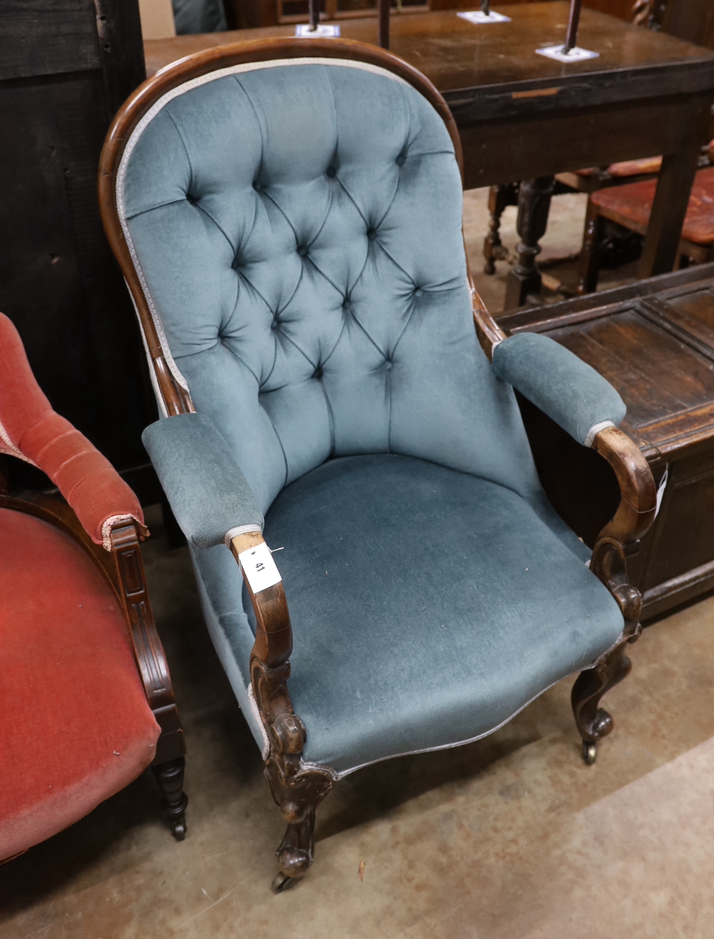A late Victorian mahogany framed button back armchair, on cabriole legs, width 68cm, depth 72cm, height 102cm